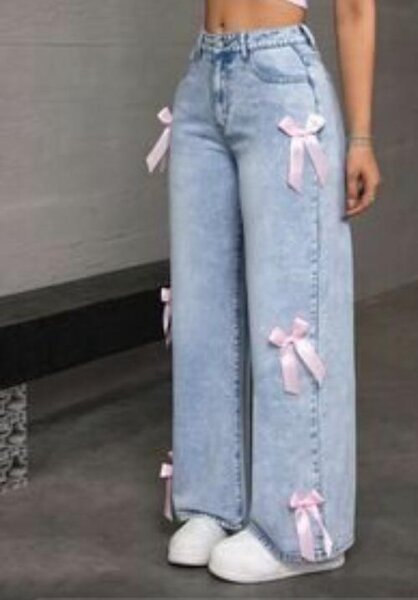 Jean large avec nœuds roses