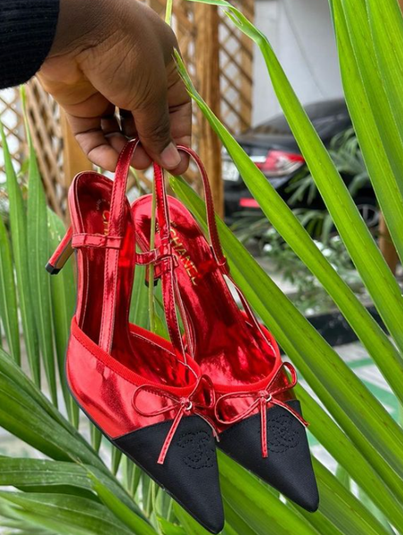 red shoes with black toe