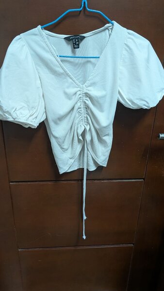 Blouse blanche plissée