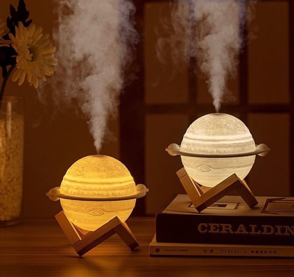 An illuminated humidifier in the form of the planet Saturn