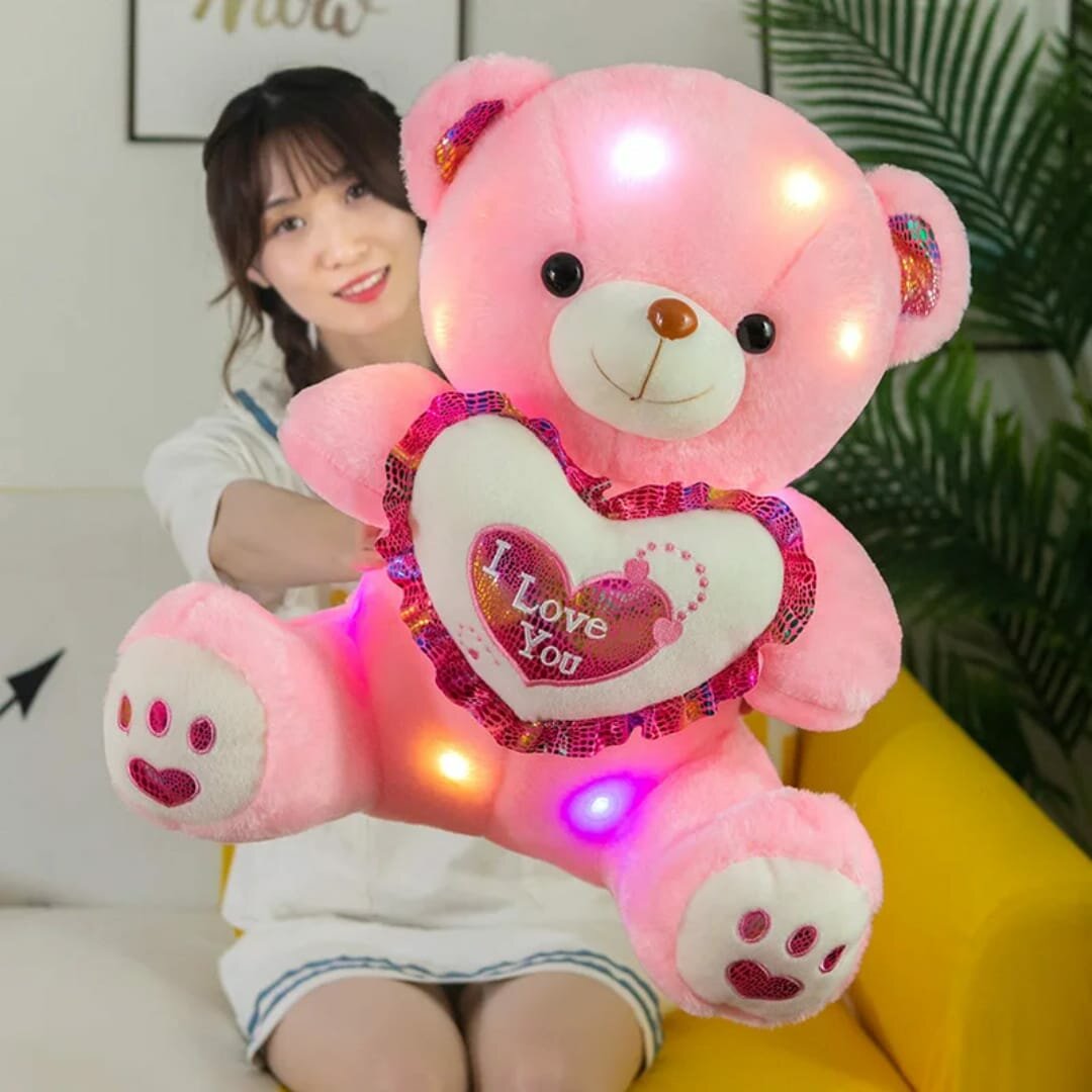 Ours en peluche lumineux rose