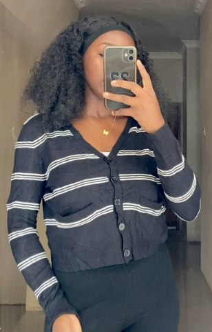 Short knitted Sweater with buttons in black size: M