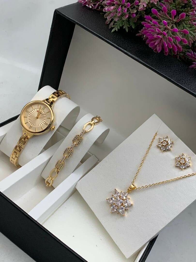CURREN WATCH WITH BRACELET AND EARRINGS.