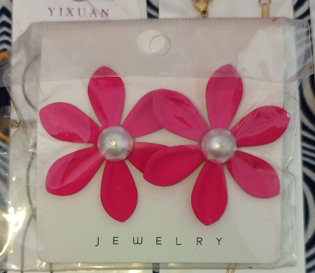 Boucle d'oreille en fleur