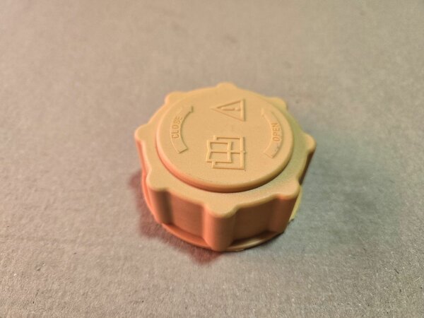 Крышка расширитьельного бочка.