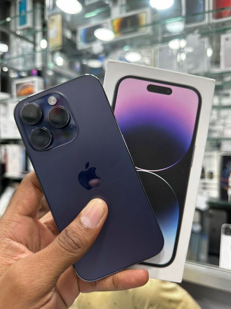 iPhone 14 Pro 128go quasi neuf avec son carton