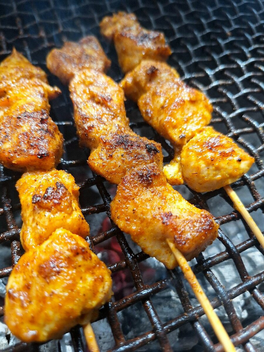 Jollof With Grilled Chicken khebabs