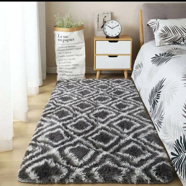 Tapis de sol en peluche gris motif géométrique