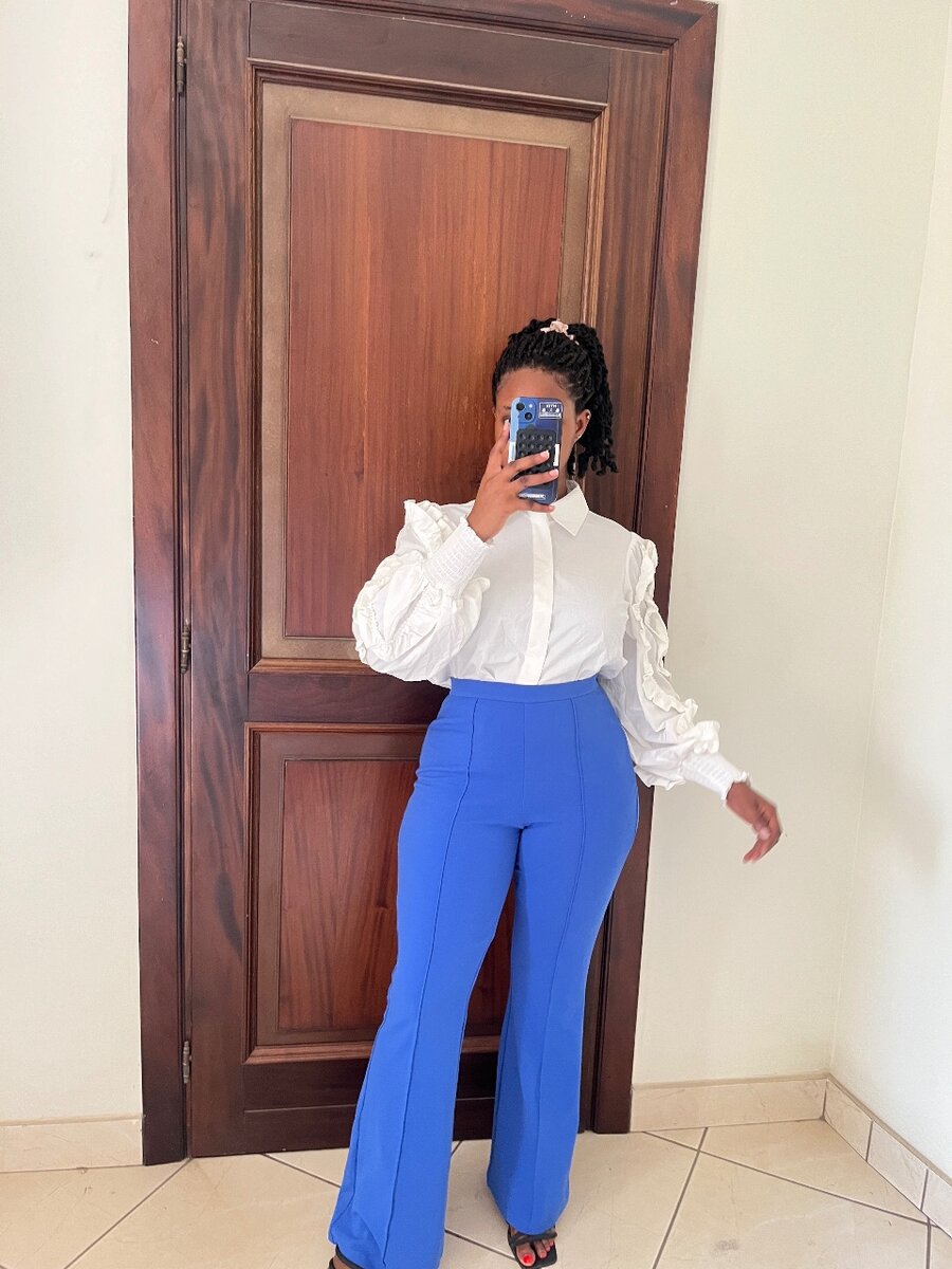 High waist flared trouser and ruffled shirt