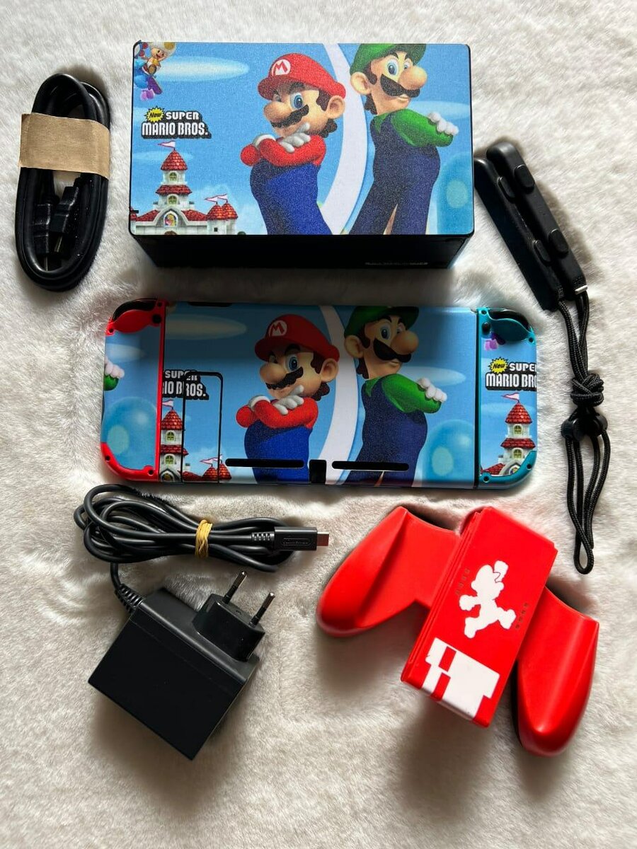 Nintendo Switch importé + jeux