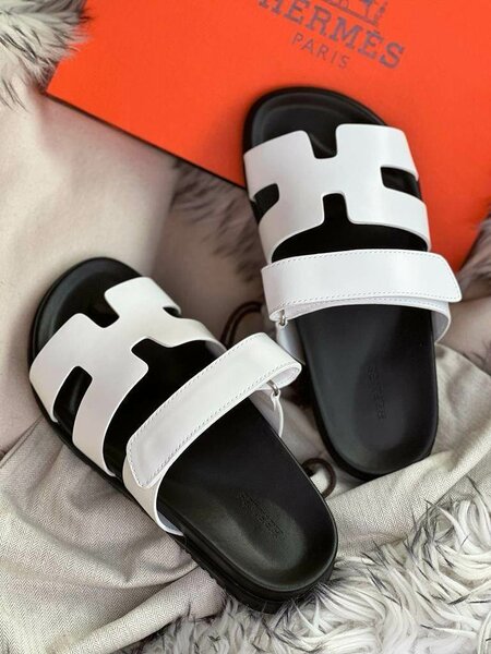 Hermes slippers available in brown, white, multicolored