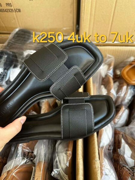 Black leather flip-flops