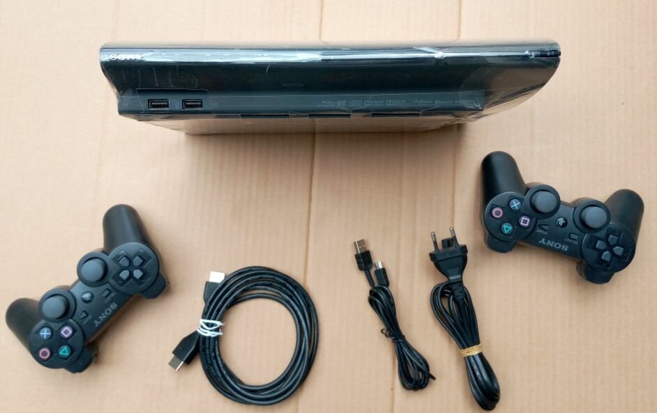 PS3 Ultra slim craquée 20 jeux