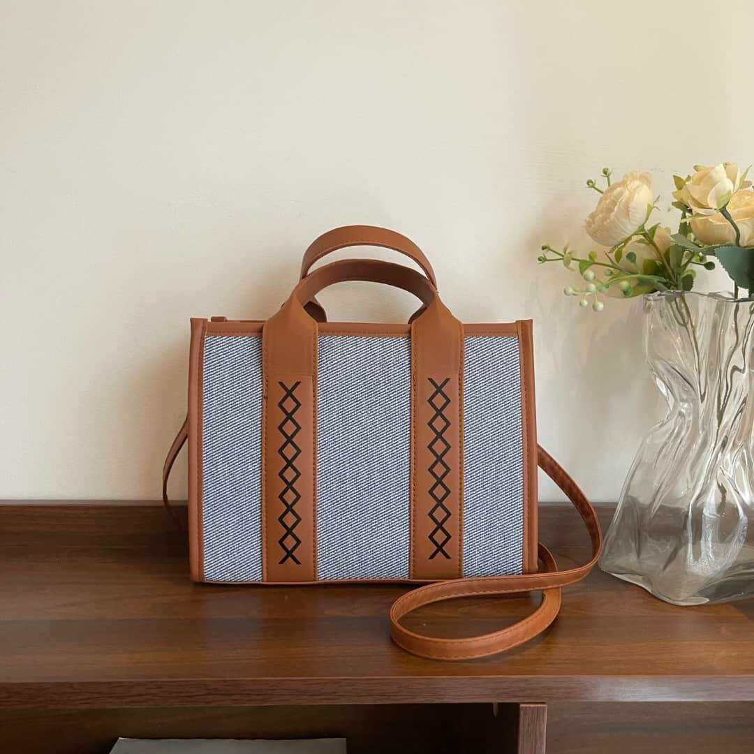 Sac à main en toile et cuir