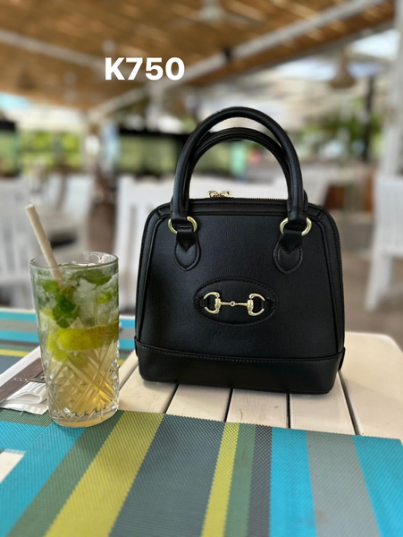 black bag with silver buckle