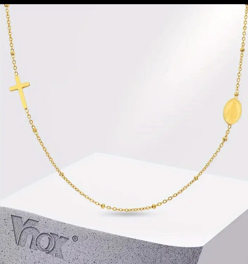 Collier doré pendentif croix