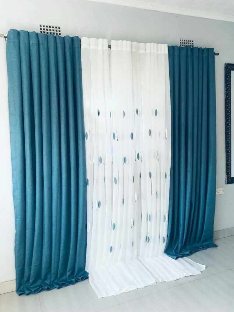 2 drops of curtains blue and white