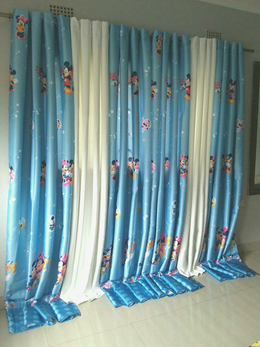 2 drops of curtains blue and white with mickey mouse patterns