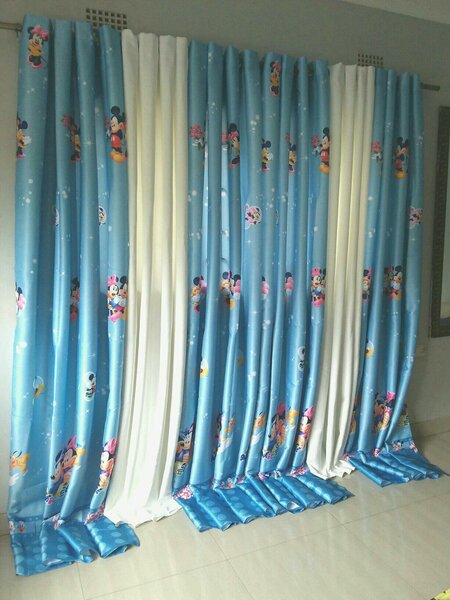 2 drops of curtains blue and white with mickey mouse patterns