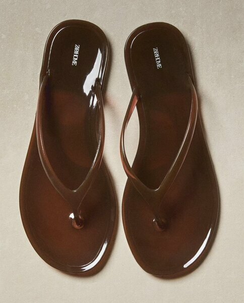 Brown glossy flip-flops