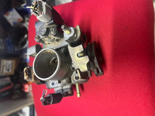 Дросленный заслонка