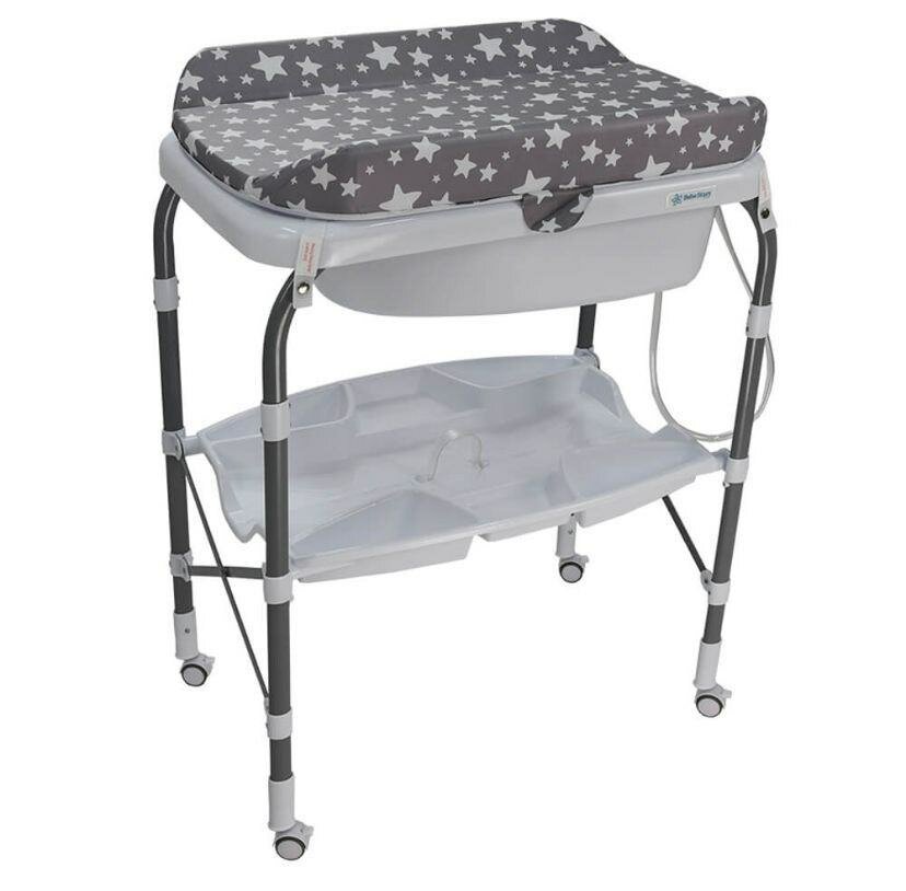 Baignoire arrêtée et table à langer