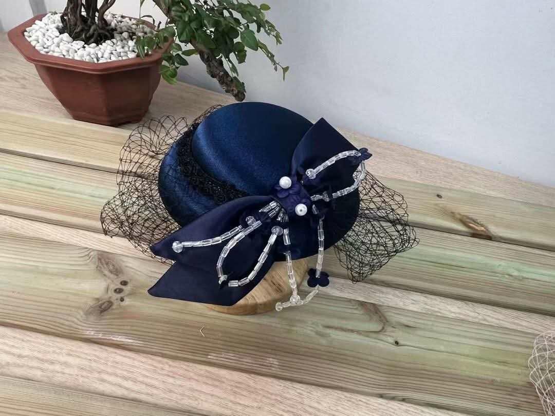 Bibi élégant avec voilette