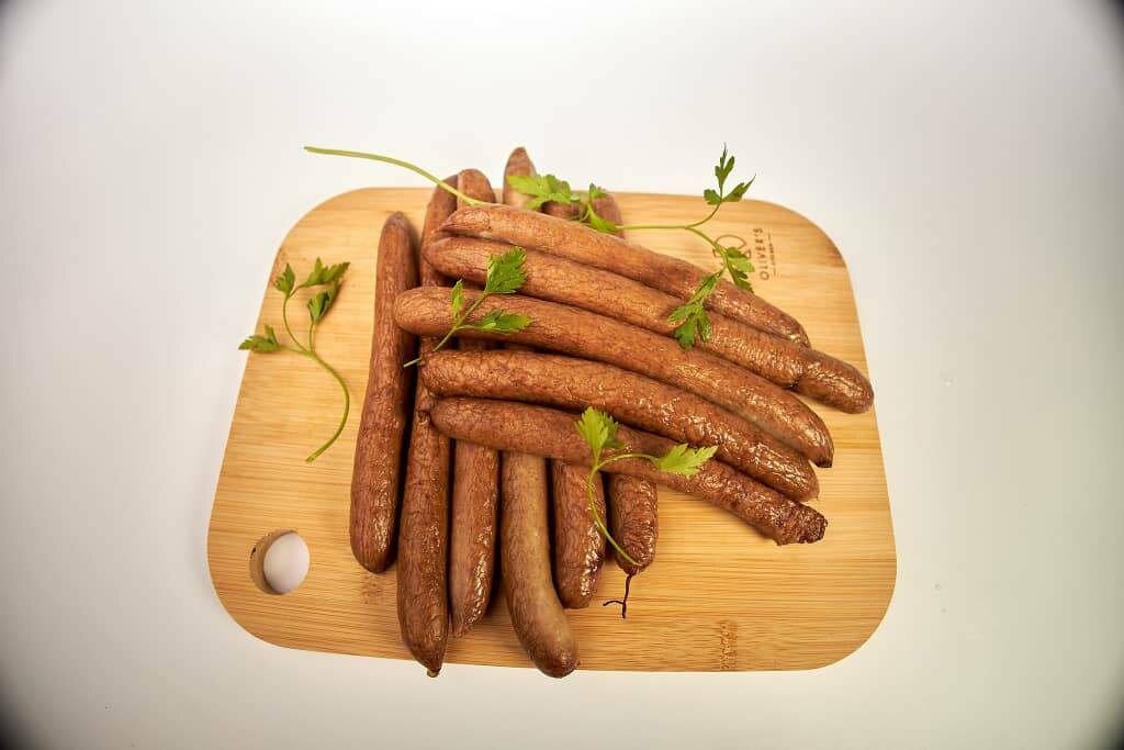 Fresh and grilled pork meat and sausages