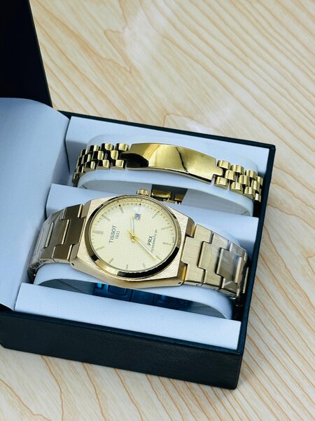 Montre en acier doré