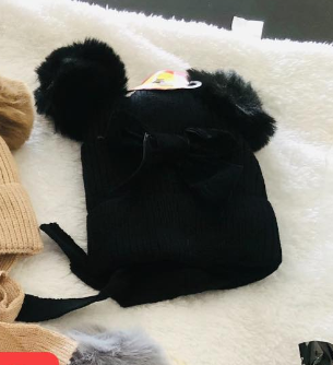 Hat with pompon for a girl black