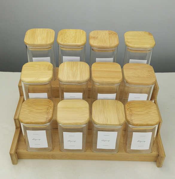  set of 12 borosilicate storage jars in a wooden rack