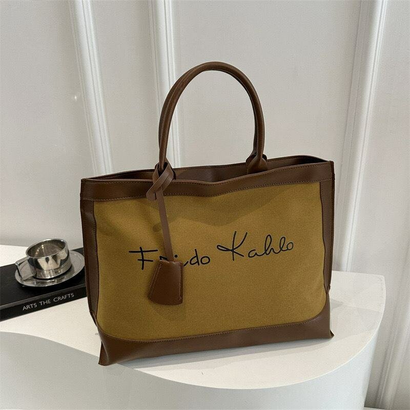 Cabas élégant en cuir et toile