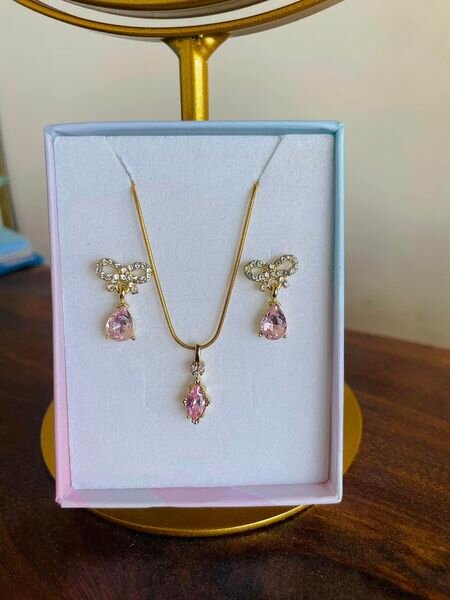 sterling silver gold plated earrings with a 14 karat gold plated