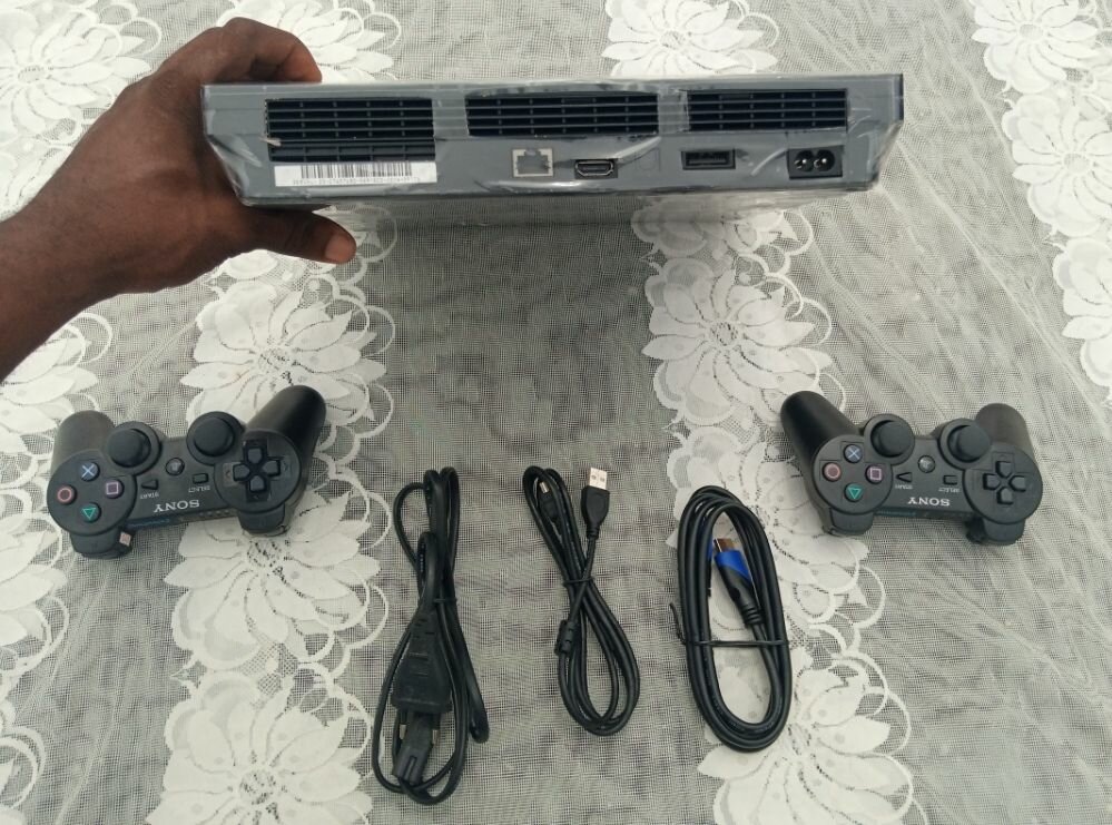 PS3 slim craquée avec 20 jeux