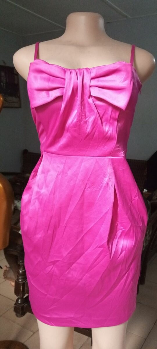 Robe rose à nœud élégant