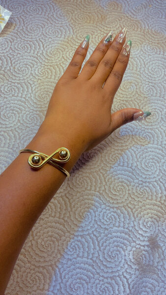 Bracelet à motif infini doré