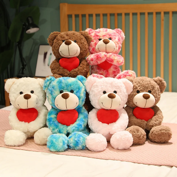 Peluches géants ours et Père Noël