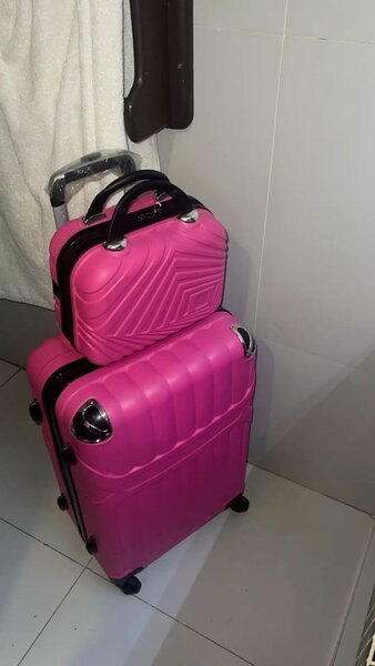 Valise rose pour voyage