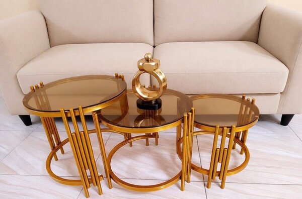 Table basse ronde en verre et métal doré
