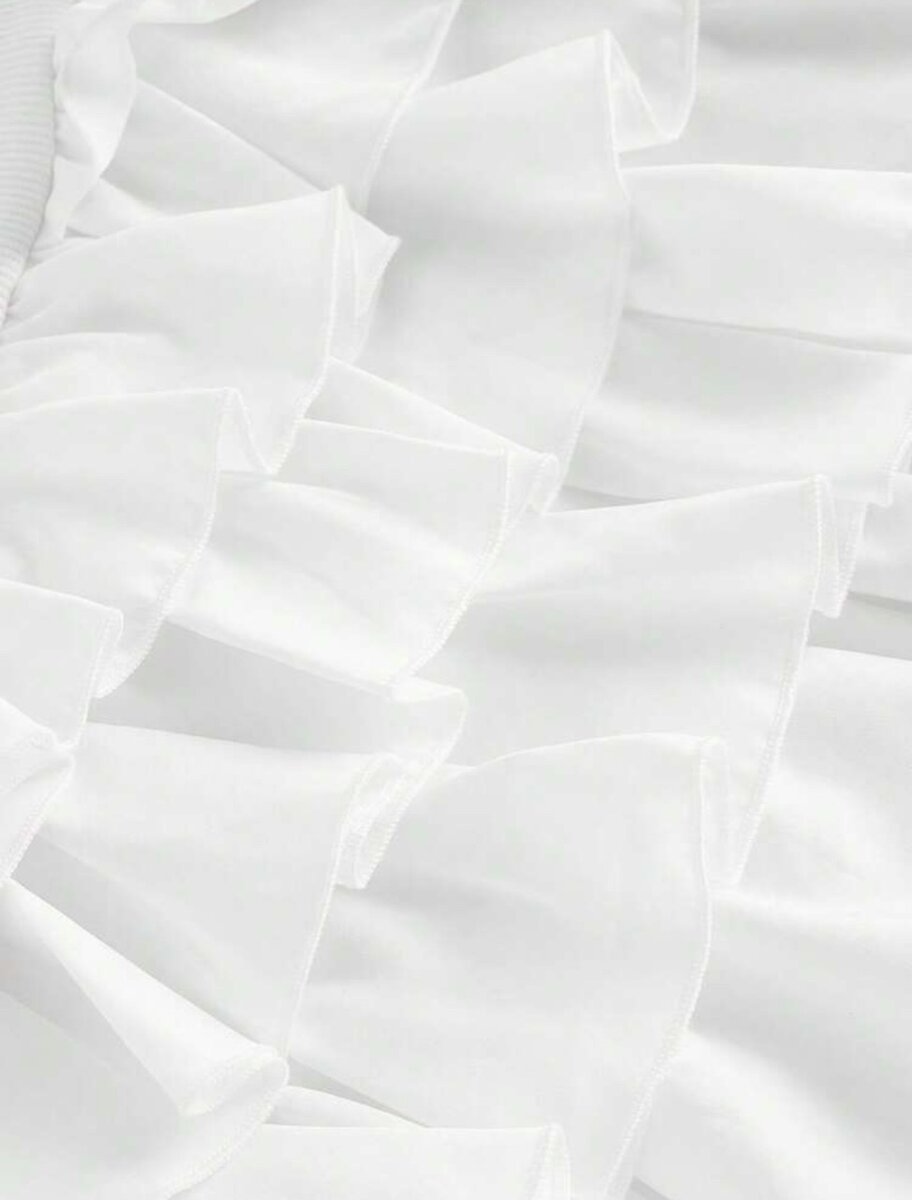 Robe blanche à volants