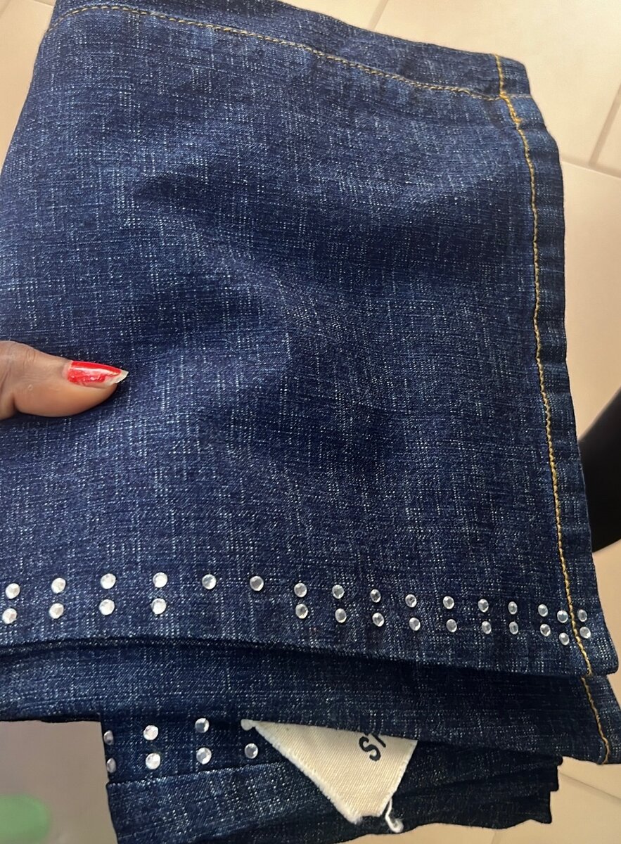 Wide leg jeans available in sizes.