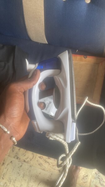 Fer à repasser compact portable