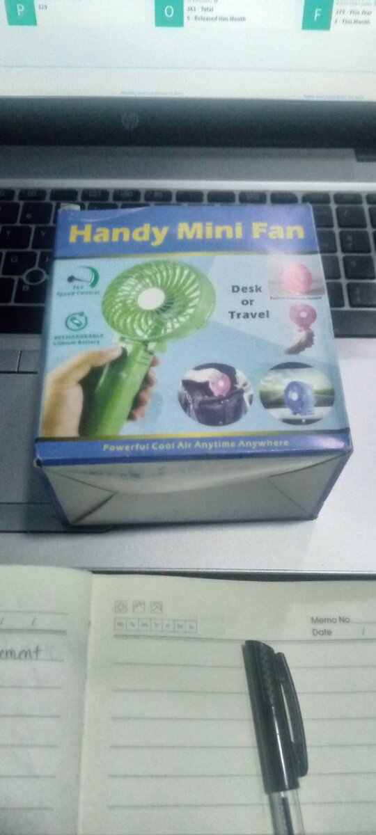 Portable hand fan