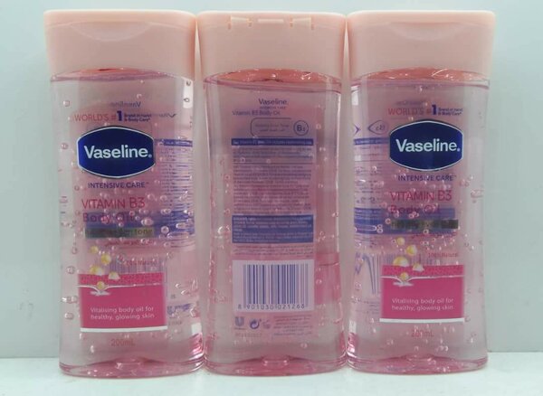 Vaseline body oil vit B3