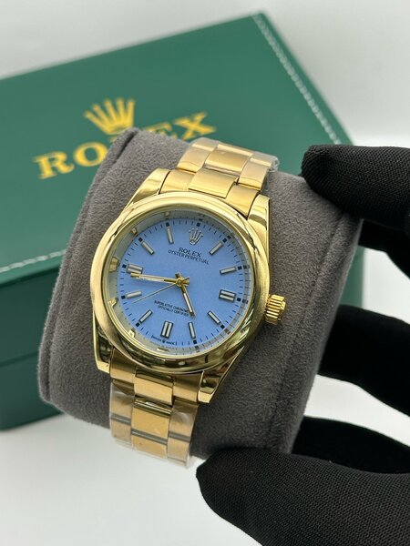 Montre Rolex Dorée Élégante