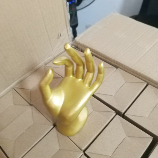 Porte-bijoux main dorée