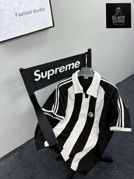 Polo noir rayé élégant