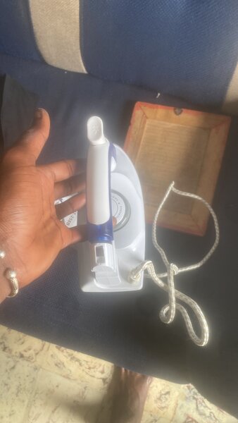 Fer à repasser compact portable