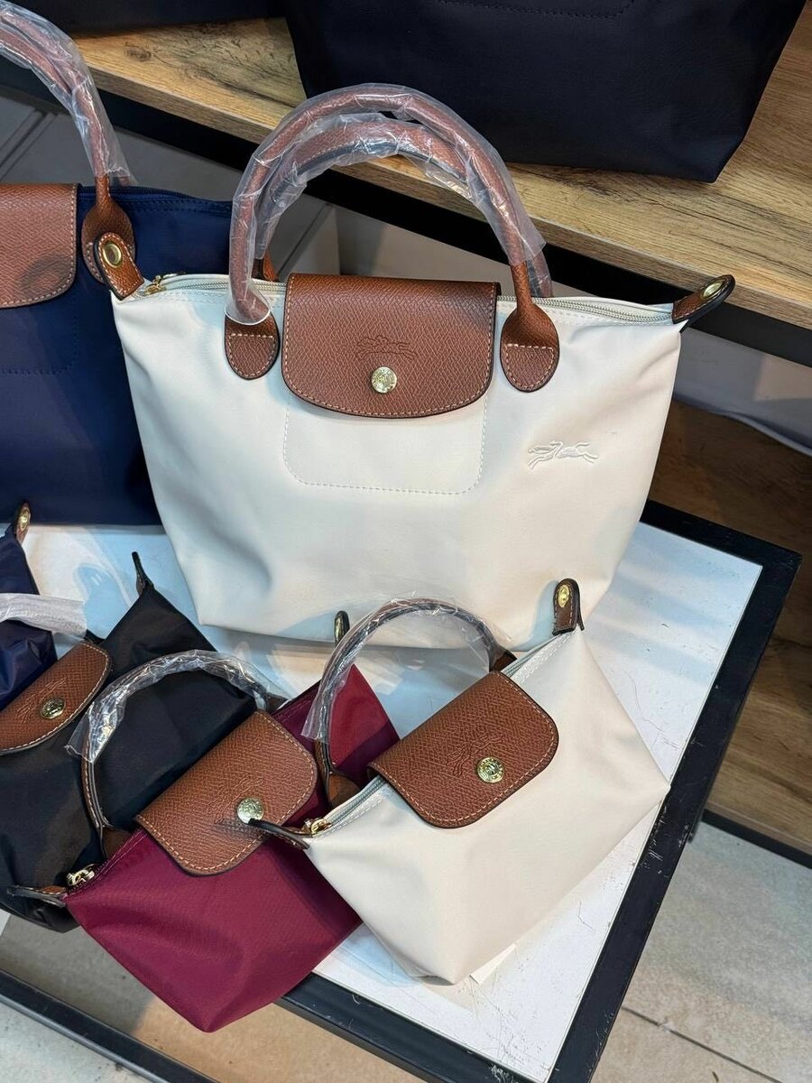 Сумочки Longchamp