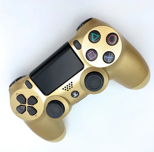 Manette sans fil dorée